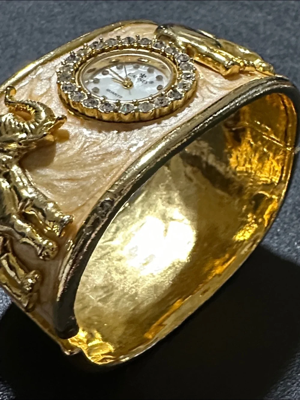 Cannes Gold Tone Elephant Hinged Enamel Clamper Bracelet Watch